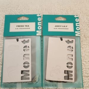 Monet Air Fresheners in Teal and White.   2 Packs Of 2.
